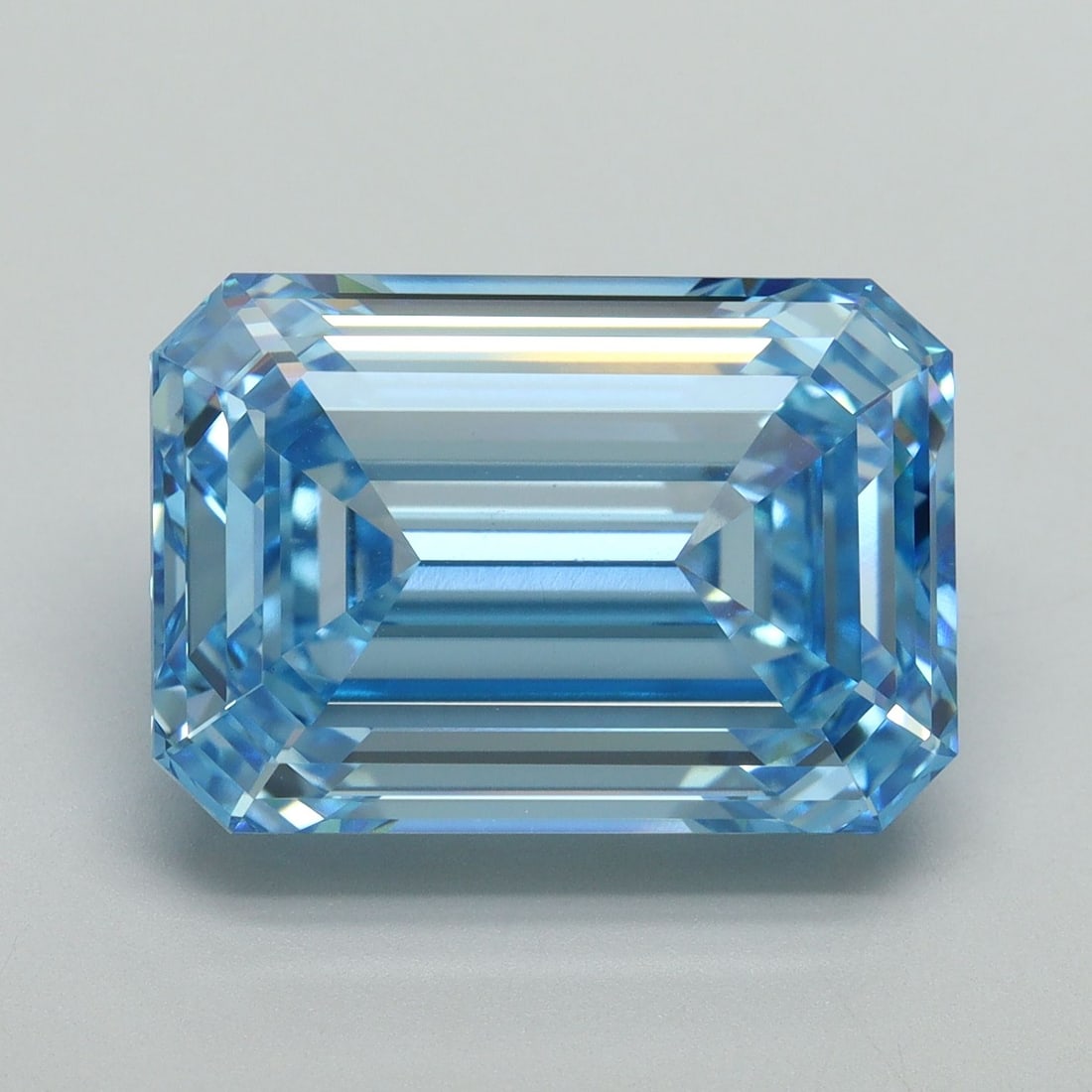 Loose Diamond - EMERALD 10.71ct Fancy Vivid Blue VS1: Loose Diamond - EMERALD 10.71ct Fancy Vivid Blue VS1 Source: This is a real non-mined Diamond that has been grown in a lab Shape: EMERALD Carats: 10.71 Color: Fancy Vivid Blue Certification: IGI Video