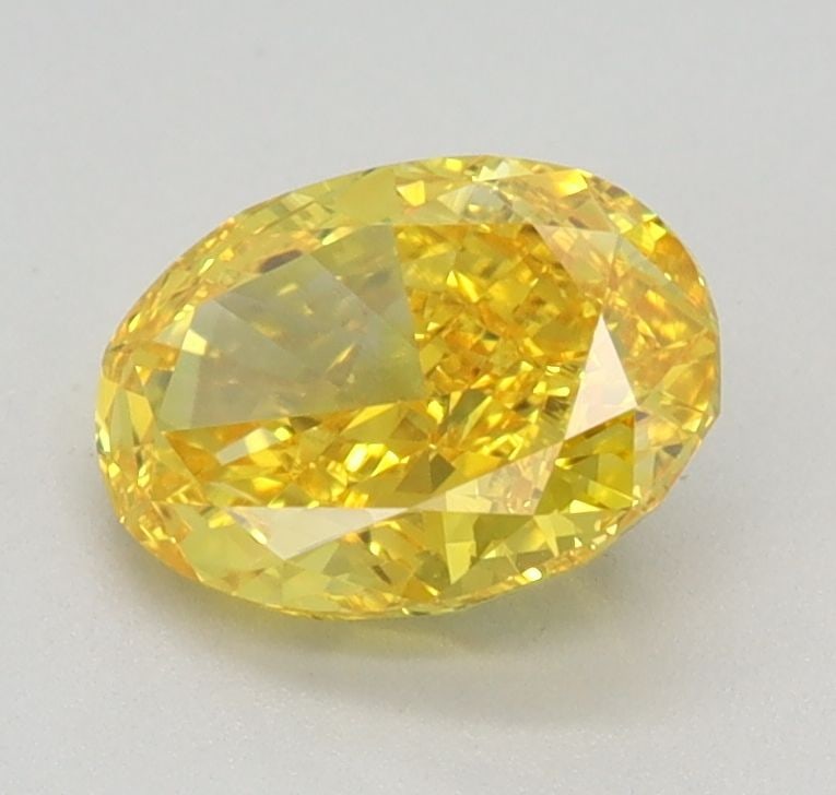 Loose Diamond - OVAL 0.9ct Fancy Vivid Yellow VS2: Loose Diamond - OVAL 0.9ct Fancy Vivid Yellow VS2 Source: This is a real non-mined Diamond that has been grown in a lab Shape: OVAL Carats: 0.9 Color: Fancy Vivid Yellow Certification: IGI Video: