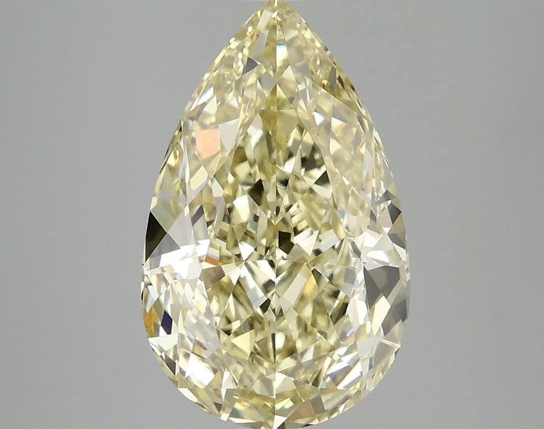 Loose Diamond - PEAR 4.1ct Fancy Vivid Yellow VS1: Loose Diamond - PEAR 4.1ct Fancy Vivid Yellow VS1 Source: This is a real non-mined Diamond that has been grown in a lab Shape: PEAR Carats: 4.1 Color: Fancy Vivid Yellow Certification: IGI Video: