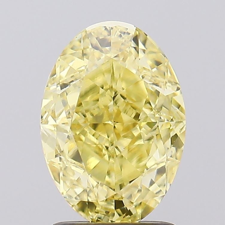 Loose Diamond - OVAL 2.1ct Fancy Intense Yellow VS1: Loose Diamond - OVAL 2.1ct Fancy Intense Yellow VS1 Source: This is a real non-mined Diamond that has been grown in a lab Shape: OVAL Carats: 2.1 Color: Fancy Intense Yellow Certification: IGI Video: