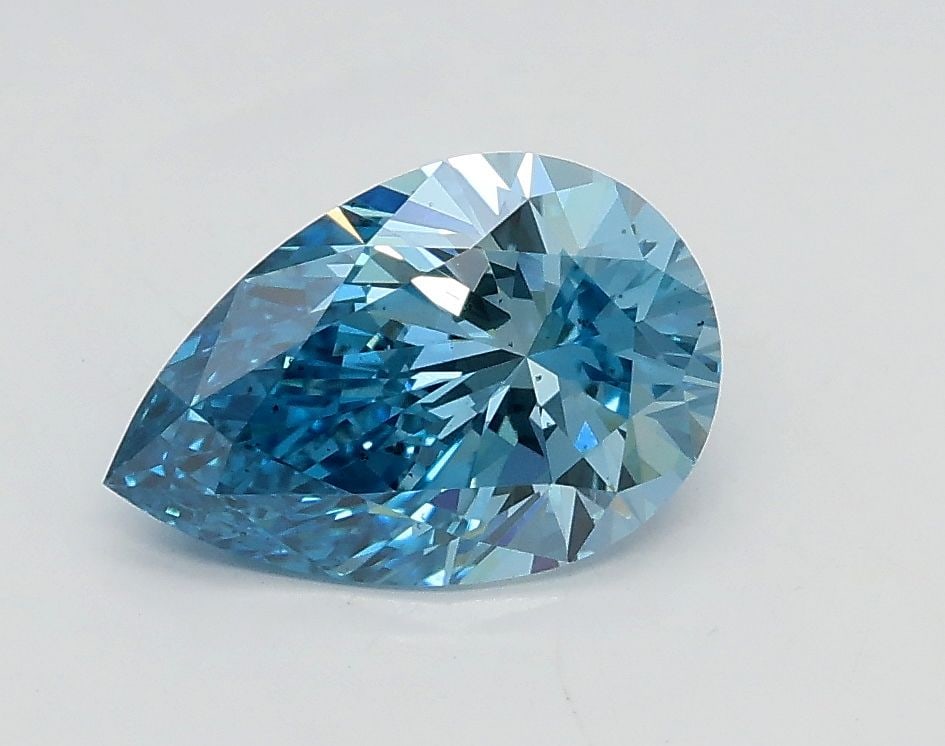 Loose Diamond - PEAR 1.01ct Fancy Vivid Blue VS2: Loose Diamond - PEAR 1.01ct Fancy Vivid Blue VS2 Source: This is a real non-mined Diamond that has been grown in a lab Shape: PEAR Carats: 1.01 Color: Fancy Vivid Blue Certification: IGI Video: