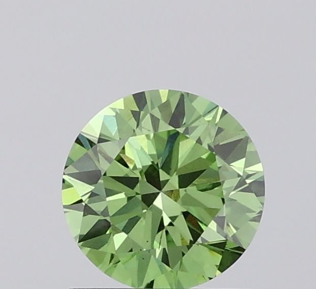 Loose Diamond - ROUND 1.01ct Fancy Vivid Green VS2: Loose Diamond - ROUND 1.01ct Fancy Vivid Green VS2 Source: This is a real non-mined Diamond that has been grown in a lab Shape: ROUND Carats: 1.01 Color: Fancy Vivid Green Certification: IGI Video: