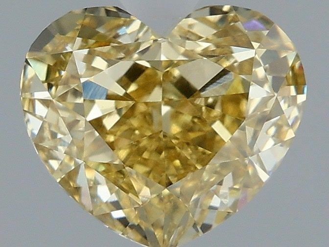 Loose Diamond - HEART 1.56ct Fancy Intense Yellow VVS2: Loose Diamond - HEART 1.56ct Fancy Intense Yellow VVS2 Source: This is a real non-mined Diamond that has been grown in a lab Shape: HEART Carats: 1.56 Color: Fancy Intense Yellow Certification: IGI Vi