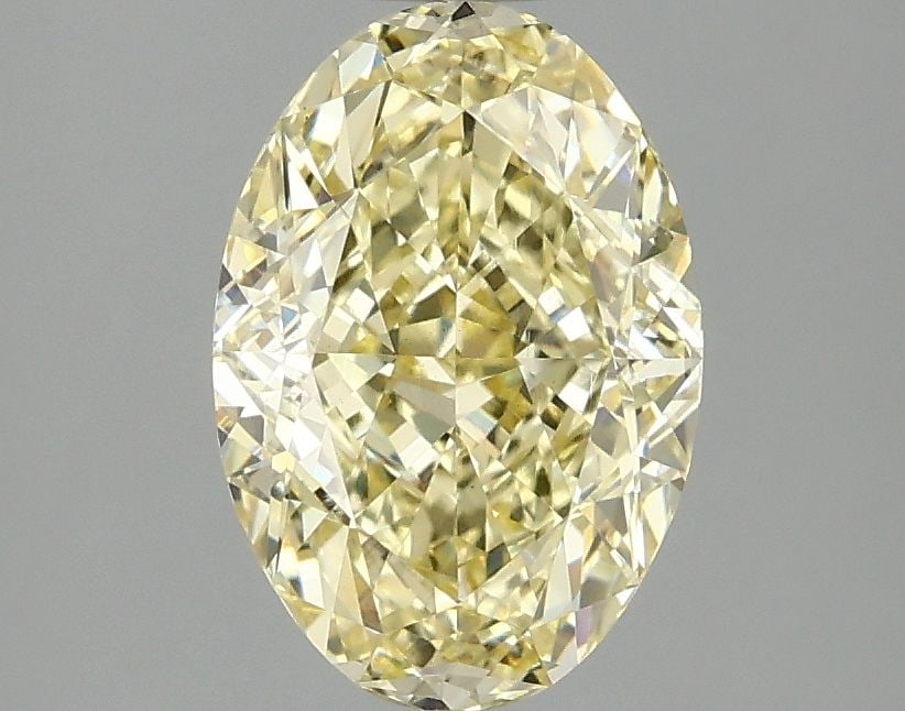 Loose Diamond - OVAL 2.1ct Fancy Intense Yellow VS2: Loose Diamond - OVAL 2.1ct Fancy Intense Yellow VS2 Source: This is a real non-mined Diamond that has been grown in a lab Shape: OVAL Carats: 2.1 Color: Fancy Intense Yellow Certification: IGI Video: