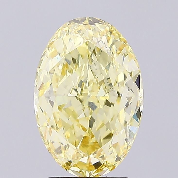 Loose Diamond - OVAL 4.05ct Fancy Vivid Yellow VS1: Loose Diamond - OVAL 4.05ct Fancy Vivid Yellow VS1 Source: This is a real non-mined Diamond that has been grown in a lab Shape: OVAL Carats: 4.05 Color: Fancy Vivid Yellow Certification: IGI Video: