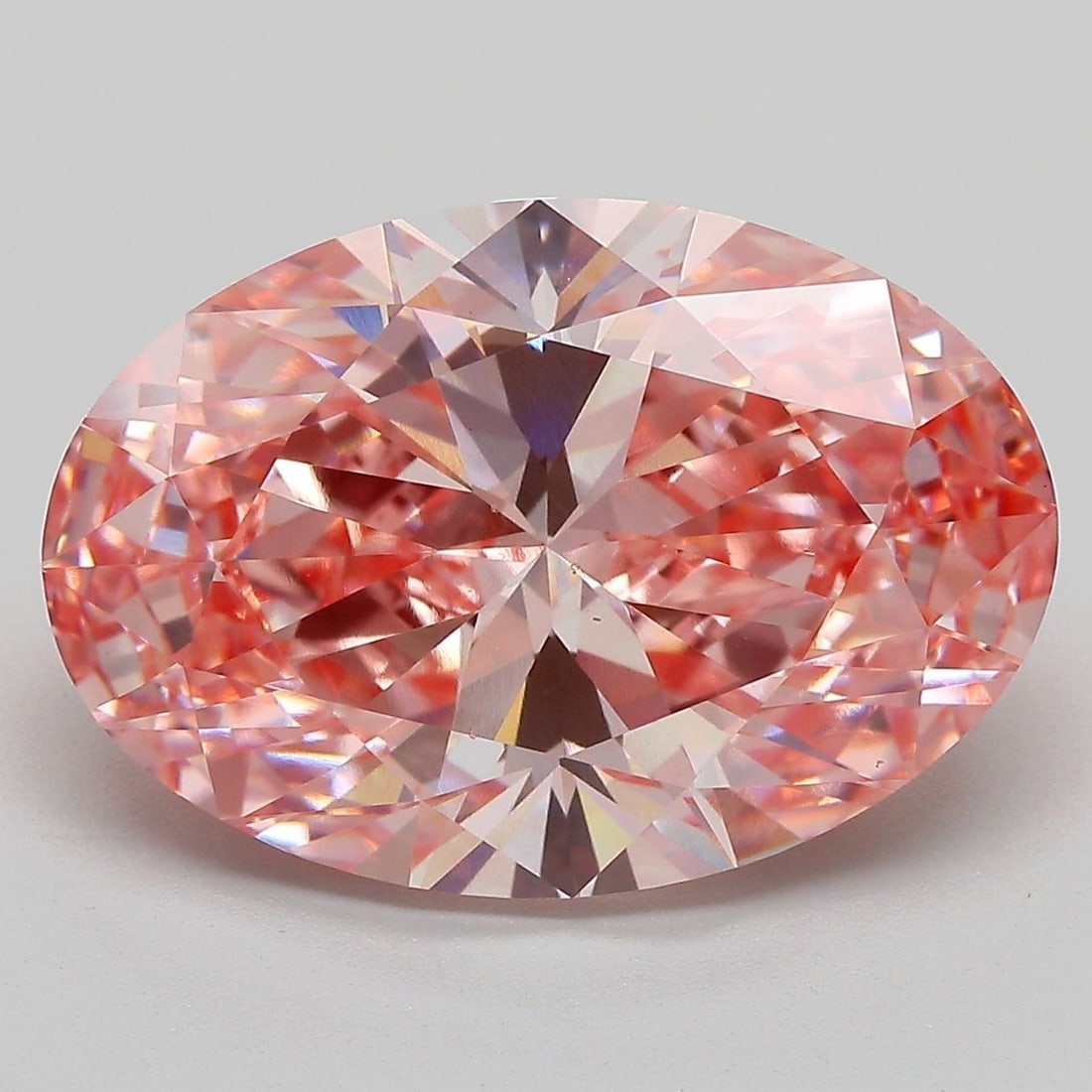 Loose Diamond - OVAL 9.01ct Fancy Vivid Pink VS1: Loose Diamond - OVAL 9.01ct Fancy Vivid Pink VS1 Source: This is a real non-mined Diamond that has been grown in a lab Shape: OVAL Carats: 9.01 Color: Fancy Vivid Pink Certification: IGI Video: