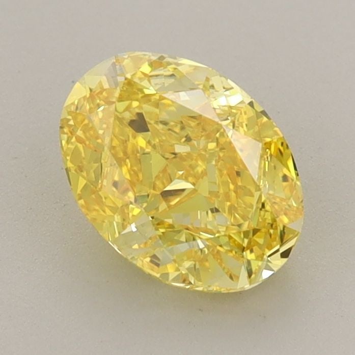 Loose Diamond - OVAL 1.24ct Fancy Vivid Yellow VVS2: Loose Diamond - OVAL 1.24ct Fancy Vivid Yellow VVS2 Source: This is a real non-mined Diamond that has been grown in a lab Shape: OVAL Carats: 1.24 Color: Fancy Vivid Yellow Certification: IGI Video: