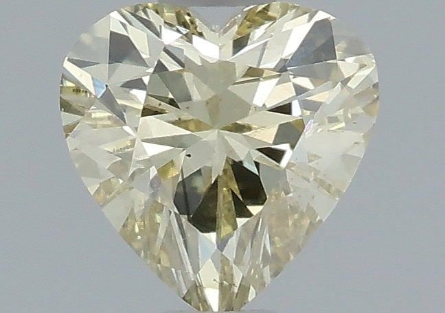 Loose Diamond - HEART 0.51ct Y-Z VS2: Loose Diamond - HEART 0.51ct Y-Z VS2 Source: This is a real non-mined Diamond that has been grown in a lab Shape: HEART Carats: 0.51 Color: Y-Z Certification: IGI Video: