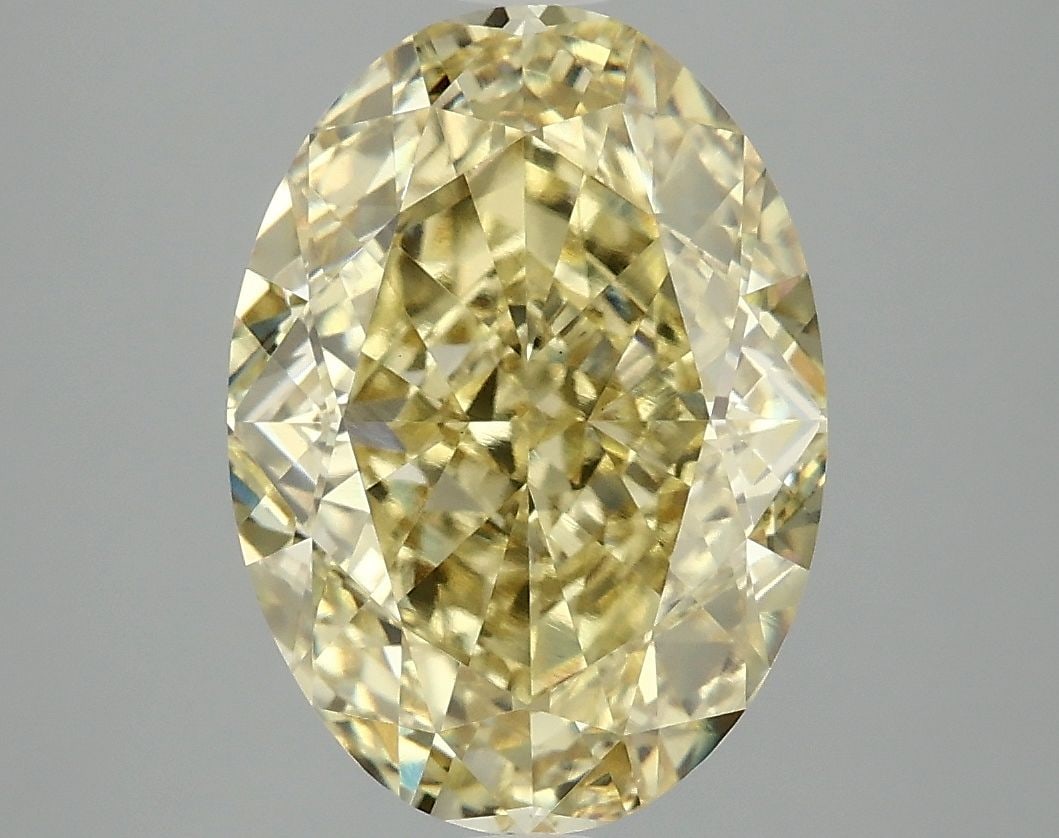 Loose Diamond - OVAL 5.09ct Fancy Intense Yellow VS1: Loose Diamond - OVAL 5.09ct Fancy Intense Yellow VS1 Source: This is a real non-mined Diamond that has been grown in a lab Shape: OVAL Carats: 5.09 Color: Fancy Intense Yellow Certification: IGI Video