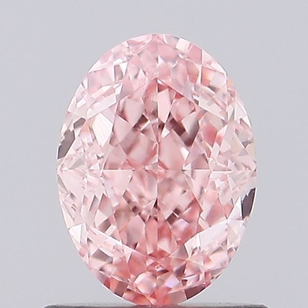 Loose Diamond - OVAL 1.08ct Fancy Vivid Pink VVS2: Loose Diamond - OVAL 1.08ct Fancy Vivid Pink VVS2 Source: This is a real non-mined Diamond that has been grown in a lab Shape: OVAL Carats: 1.08 Color: Fancy Vivid Pink Certification: IGI Video:
