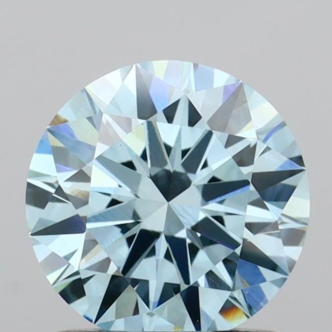 Ideal Loose Diamond - ROUND 1.05ct Fancy Vivid Blue VVS2: Ideal Loose Diamond - ROUND 1.05ct Fancy Vivid Blue VVS2 Source: This is a real non-mined Diamond that has been grown in a lab Shape: ROUND Carats: 1.05 Color: Fancy Vivid Blue Certification: IGI Vide