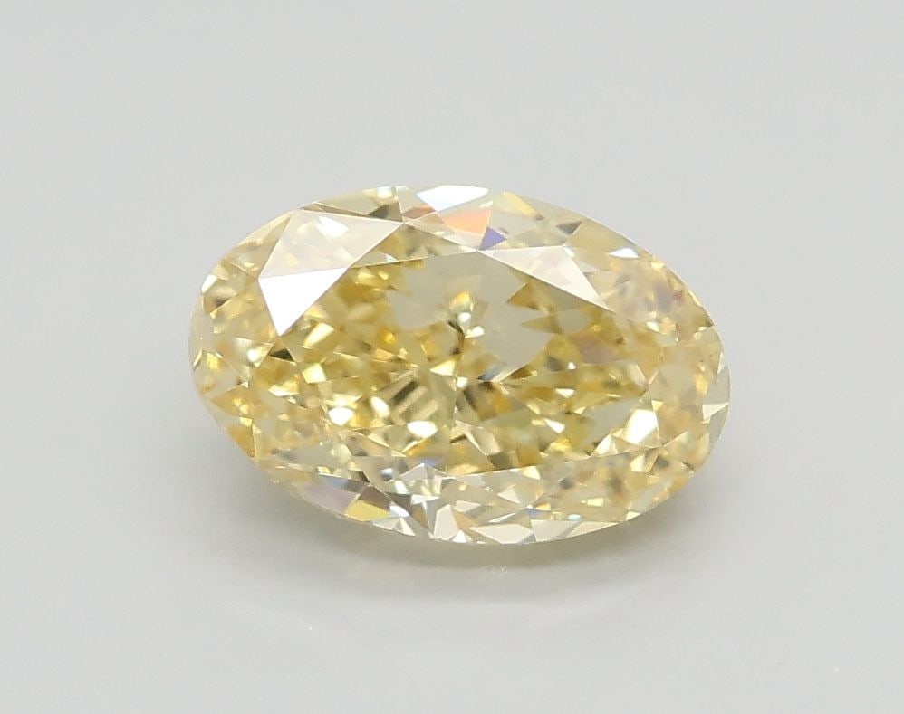 Loose Diamond - OVAL 1.21ct Fancy Light Yellow VS2: Loose Diamond - OVAL 1.21ct Fancy Light Yellow VS2 Source: This is a real non-mined Diamond that has been grown in a lab Shape: OVAL Carats: 1.21 Color: Fancy Light Yellow Certification: IGI Video: