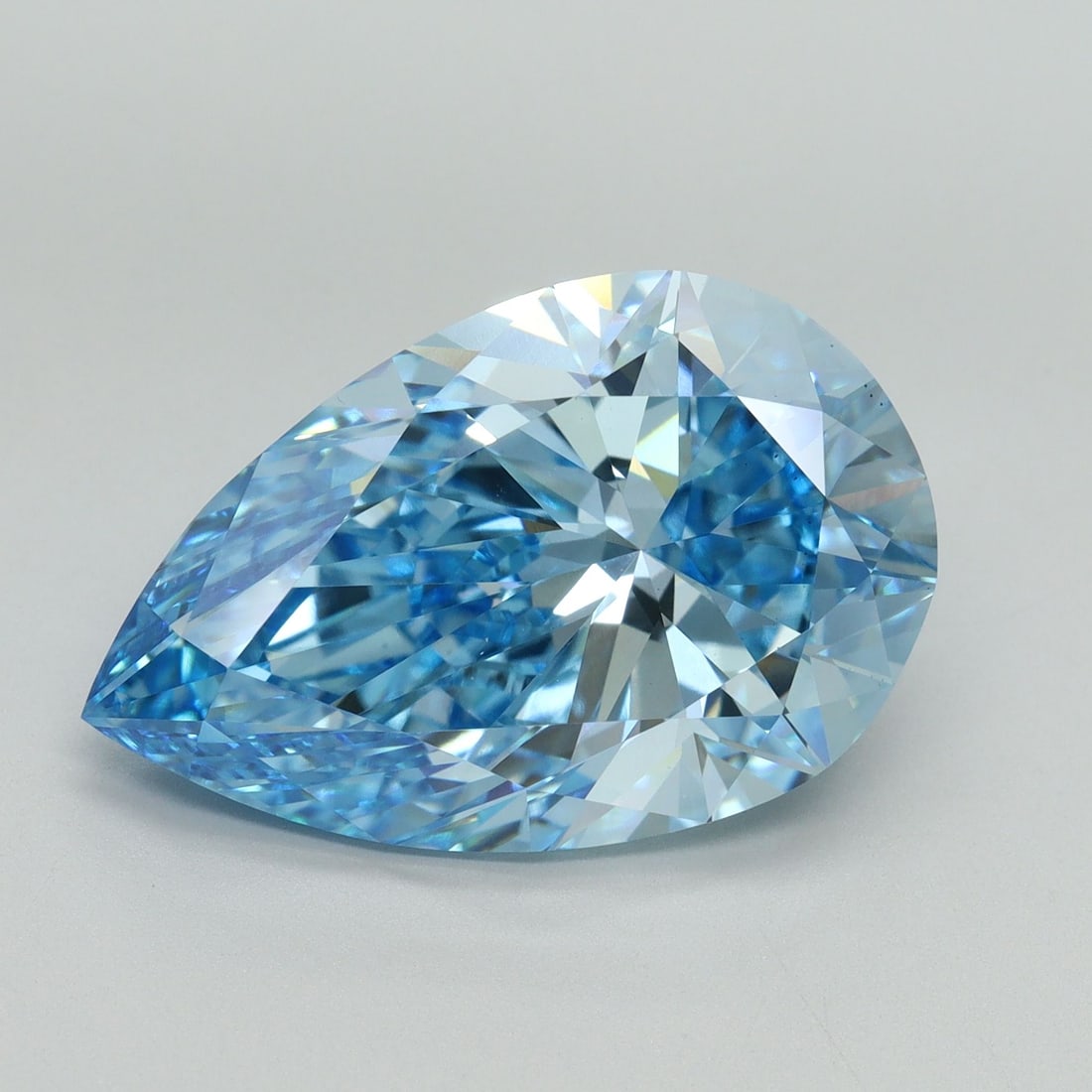Loose Diamond - PEAR 10.27ct Fancy Vivid Blue VS1: Loose Diamond - PEAR 10.27ct Fancy Vivid Blue VS1 Source: This is a real non-mined Diamond that has been grown in a lab Shape: PEAR Carats: 10.27 Color: Fancy Vivid Blue Certification: IGI Video: