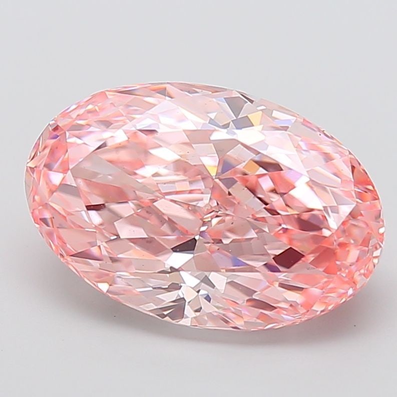 Loose Diamond - OVAL 7.04ct Fancy Vivid Pink VS2: Loose Diamond - OVAL 7.04ct Fancy Vivid Pink VS2 Source: This is a real non-mined Diamond that has been grown in a lab Shape: OVAL Carats: 7.04 Color: Fancy Vivid Pink Certification: IGI Video: