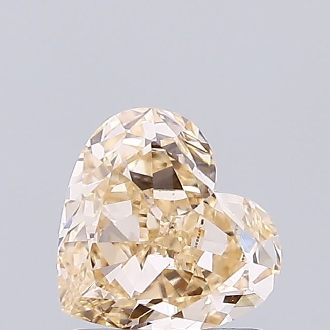 Loose Diamond - HEART 1.05ct Light Brown VVS2: Loose Diamond - HEART 1.05ct Light Brown VVS2 Source: This is a real non-mined Diamond that has been grown in a lab Shape: HEART Carats: 1.05 Color: Light Brown Certification: IGI Video: