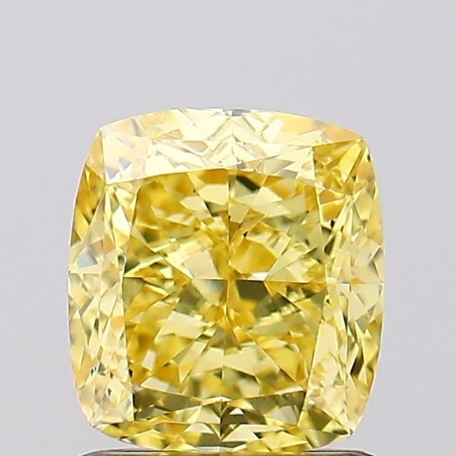 Loose Diamond - CUSHION MODIFIED 1.38ct Fancy Vivid Yellow VS1: Loose Diamond - CUSHION MODIFIED 1.38ct Fancy Vivid Yellow VS1 Source: This is a real non-mined Diamond that has been grown in a lab Shape: CUSHION MODIFIED Carats: 1.38 Color: Fancy Vivid Yellow Cert