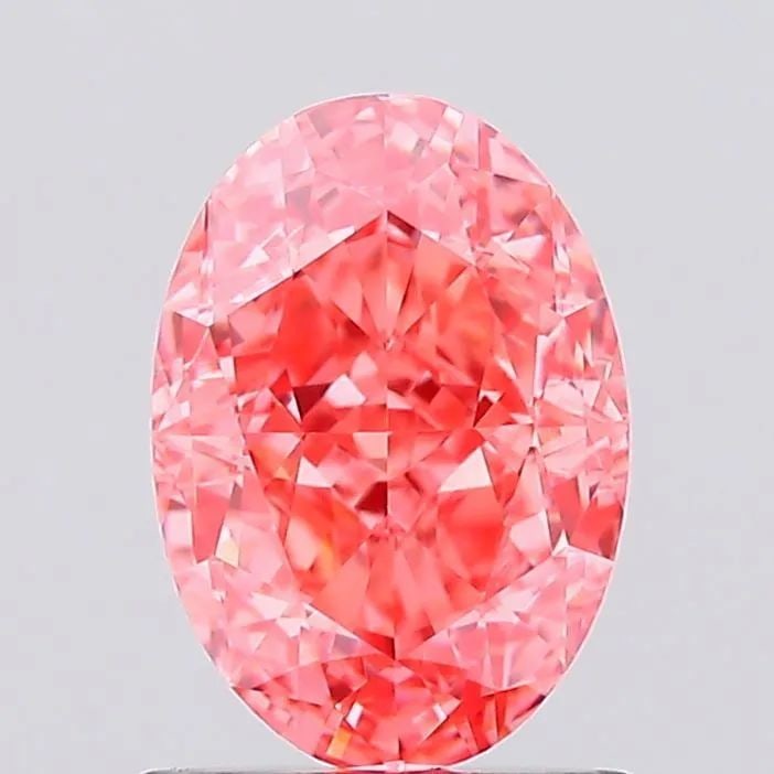 Loose Diamond - OVAL 1.2ct Fancy Vivid Pink VVS2: Loose Diamond - OVAL 1.2ct Fancy Vivid Pink VVS2 Source: This is a real non-mined Diamond that has been grown in a lab Shape: OVAL Carats: 1.2 Color: Fancy Vivid Pink Certification: IGI Video: