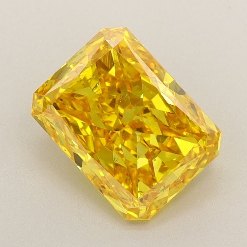 Loose Diamond - RADIANT 1.44ct Fancy Vivid Yellow SI1: Loose Diamond - RADIANT 1.44ct Fancy Vivid Yellow SI1 Source: This is a real non-mined Diamond that has been grown in a lab Shape: RADIANT Carats: 1.44 Color: Fancy Vivid Yellow Certification: IGI Vid