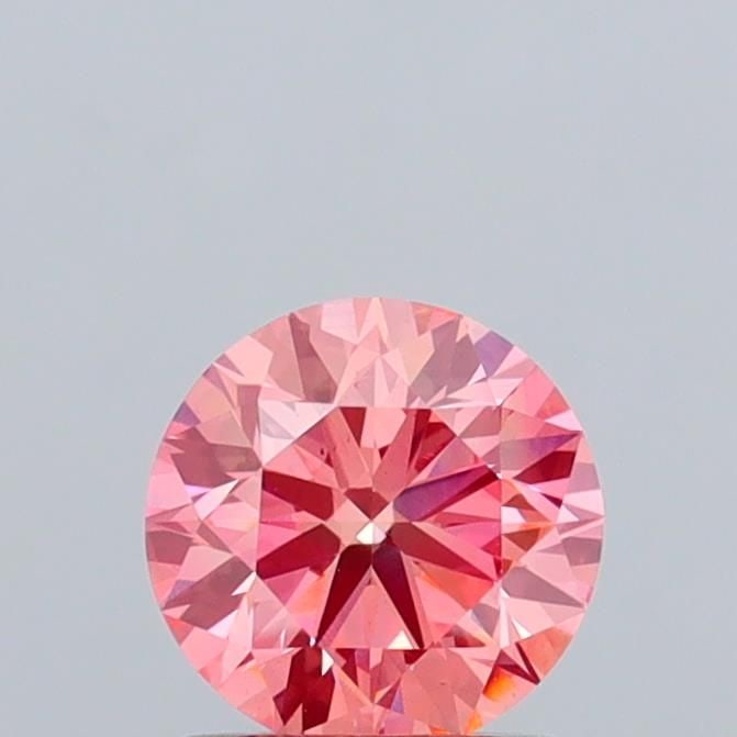 Ideal Loose Diamond - ROUND 1.09ct Fancy Vivid Pink VS1: Ideal Loose Diamond - ROUND 1.09ct Fancy Vivid Pink VS1 Source: This is a real non-mined Diamond that has been grown in a lab Shape: ROUND Carats: 1.09 Color: Fancy Vivid Pink Certification: IGI Video