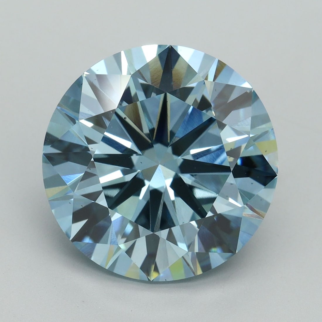 Ideal Loose Diamond - ROUND 9.3ct Fancy Vivid Blue VS2: Ideal Loose Diamond - ROUND 9.3ct Fancy Vivid Blue VS2 Source: This is a real non-mined Diamond that has been grown in a lab Shape: ROUND Carats: 9.3 Color: Fancy Vivid Blue Certification: IGI Video: