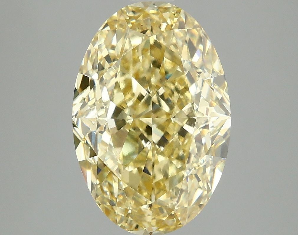 Loose Diamond - OVAL 4.09ct Fancy Intense Yellow VS1: Loose Diamond - OVAL 4.09ct Fancy Intense Yellow VS1 Source: This is a real non-mined Diamond that has been grown in a lab Shape: OVAL Carats: 4.09 Color: Fancy Intense Yellow Certification: IGI Video