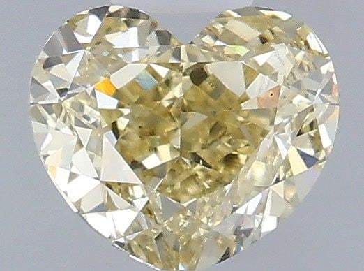 Loose Diamond - HEART 1.02ct Fancy Yellow VS2: Loose Diamond - HEART 1.02ct Fancy Yellow VS2 Source: This is a real non-mined Diamond that has been grown in a lab Shape: HEART Carats: 1.02 Color: Fancy Yellow Certification: IGI Video: