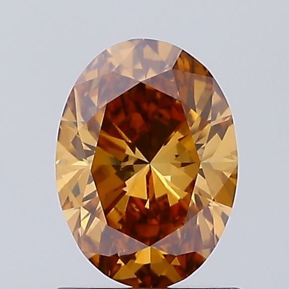 Loose Diamond - OVAL 0.88ct Fancy Orangey Brown VVS2: Loose Diamond - OVAL 0.88ct Fancy Orangey Brown VVS2 Source: This is a real non-mined Diamond that has been grown in a lab Shape: OVAL Carats: 0.88 Color: Fancy Orangey Brown Certification: IGI Video: