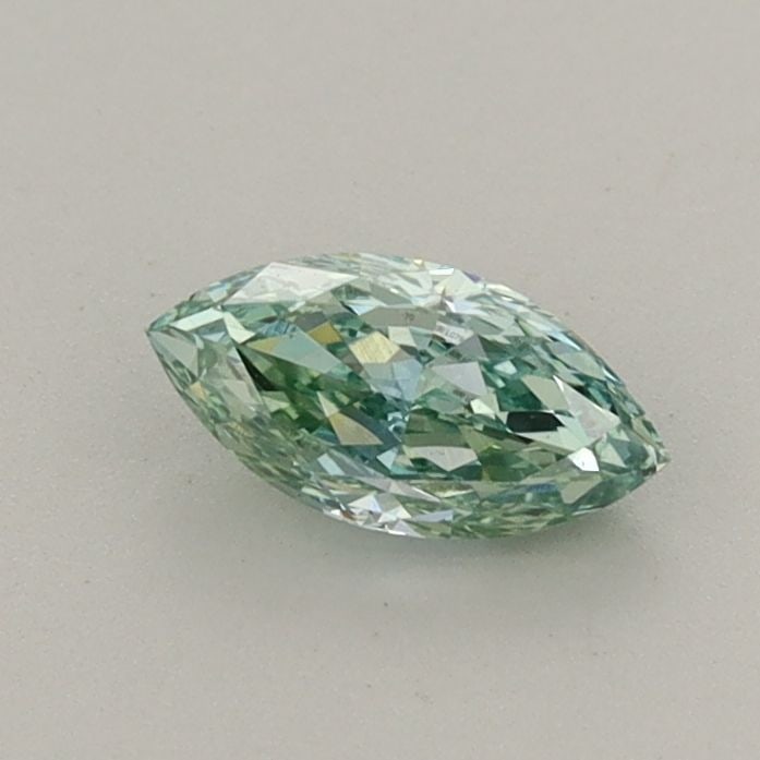 Loose Diamond - MARQUISE 0.48ct Fancy Vivid Green VVS2: Loose Diamond - MARQUISE 0.48ct Fancy Vivid Green VVS2 Source: This is a real non-mined Diamond that has been grown in a lab Shape: MARQUISE Carats: 0.48 Color: Fancy Vivid Green Certification: IGI Vi