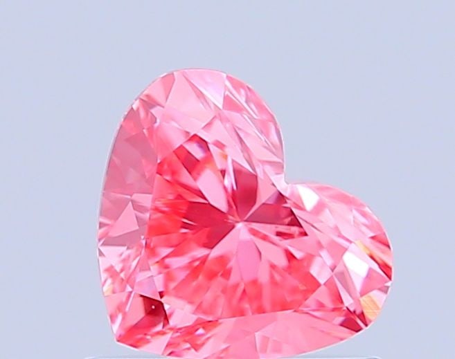 Loose Diamond - HEART 0.73ct Fancy Vivid Pink VS1: Loose Diamond - HEART 0.73ct Fancy Vivid Pink VS1 Source: This is a real non-mined Diamond that has been grown in a lab Shape: HEART Carats: 0.73 Color: Fancy Vivid Pink Certification: IGI Video: