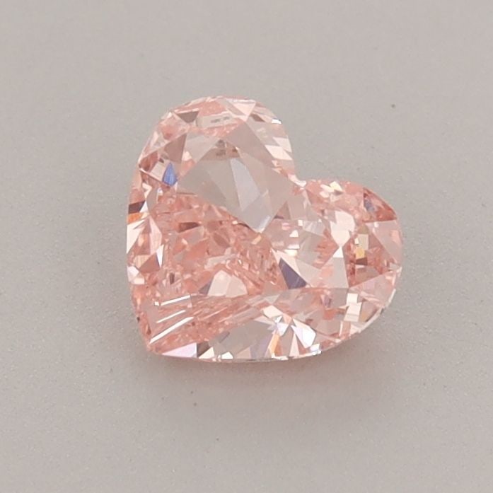 Loose Diamond - HEART 0.71ct Fancy Vivid Pink VVS2: Loose Diamond - HEART 0.71ct Fancy Vivid Pink VVS2 Source: This is a real non-mined Diamond that has been grown in a lab Shape: HEART Carats: 0.71 Color: Fancy Vivid Pink Certification: IGI Video: