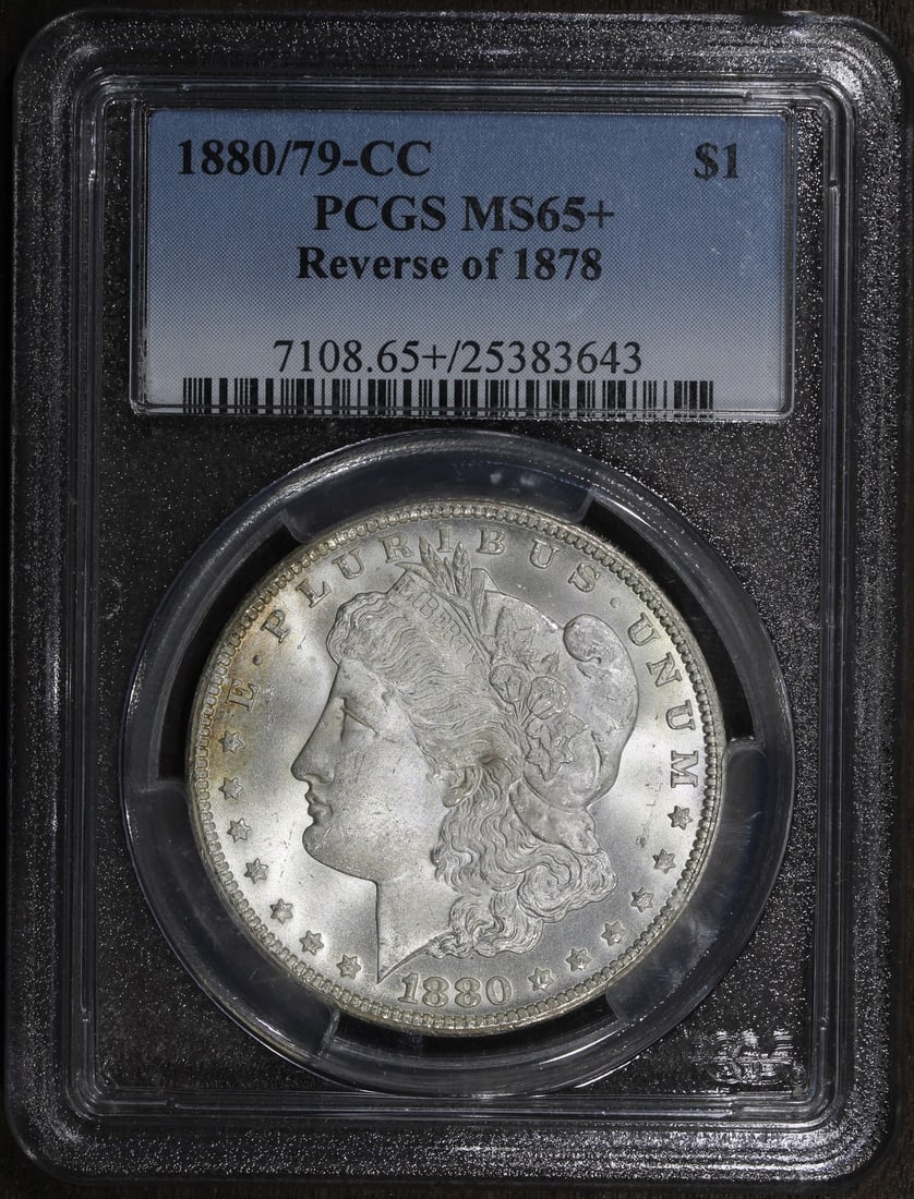 PCGS MS65 Carson City Morgan Silver Dollar 1880 79 CC Reverse of 1878: PCGS MS65 Carson City Morgan Silver Dollar 1880 79 CC Reverse of 1878 This is an 1880/79-CC Morgan Silver Dollar graded MS65+ by PCGS, featuring the Reverse of 1878. Struck in 0.9 fine silver at the C