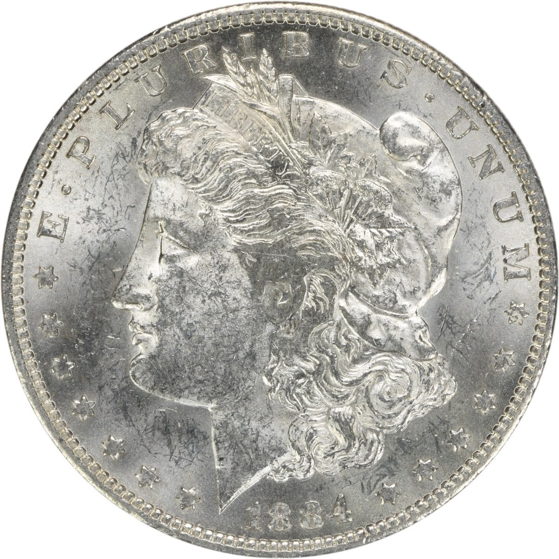 Uncirculated 1884-O Silver Morgan Dollar Brilliant Uncertified US Coin: Uncirculated 1884-O Silver Morgan Dollar Brilliant Uncertified US Coin This is an 1884-O Morgan Silver Dollar from the United States, featuring the New Orleans mint mark. The coin is composed of silve