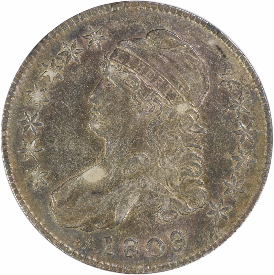 1809 United States Bust Half Dollar Lettered Edge Silver 50C EF Uncertified: 1809 United States Bust Half Dollar Lettered Edge Silver 50C EF Uncertified This 1809 Bust Half Dollar features the XXX edge and was minted in Philadelphia. Designed by John Reich, it is composed of 8