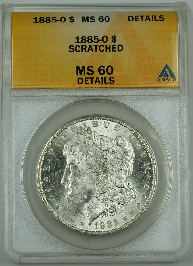 ANACS MS-60 Details 1885-O Morgan Silver Dollar Scratched Uncirculated: ANACS MS-60 Details 1885-O Morgan Silver Dollar Scratched Uncirculated This is an 1885-O Morgan Silver Dollar certified by ANACS with a grade of MS-60 Details. The coin is uncirculated but has been no