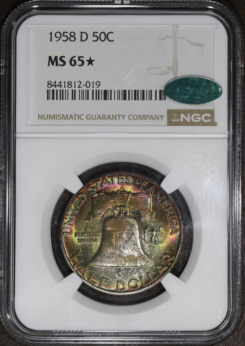 NGC MS65 Star CAC 1958-D Franklin Half Dollar Rainbow Toning: NGC MS65 Star CAC 1958-D Franklin Half Dollar Rainbow Toning Pre-owned 1958-D Franklin Half Dollar certified by NGC with a numerical grade of 65. The title notes a STAR CAC designation and rainbow ton