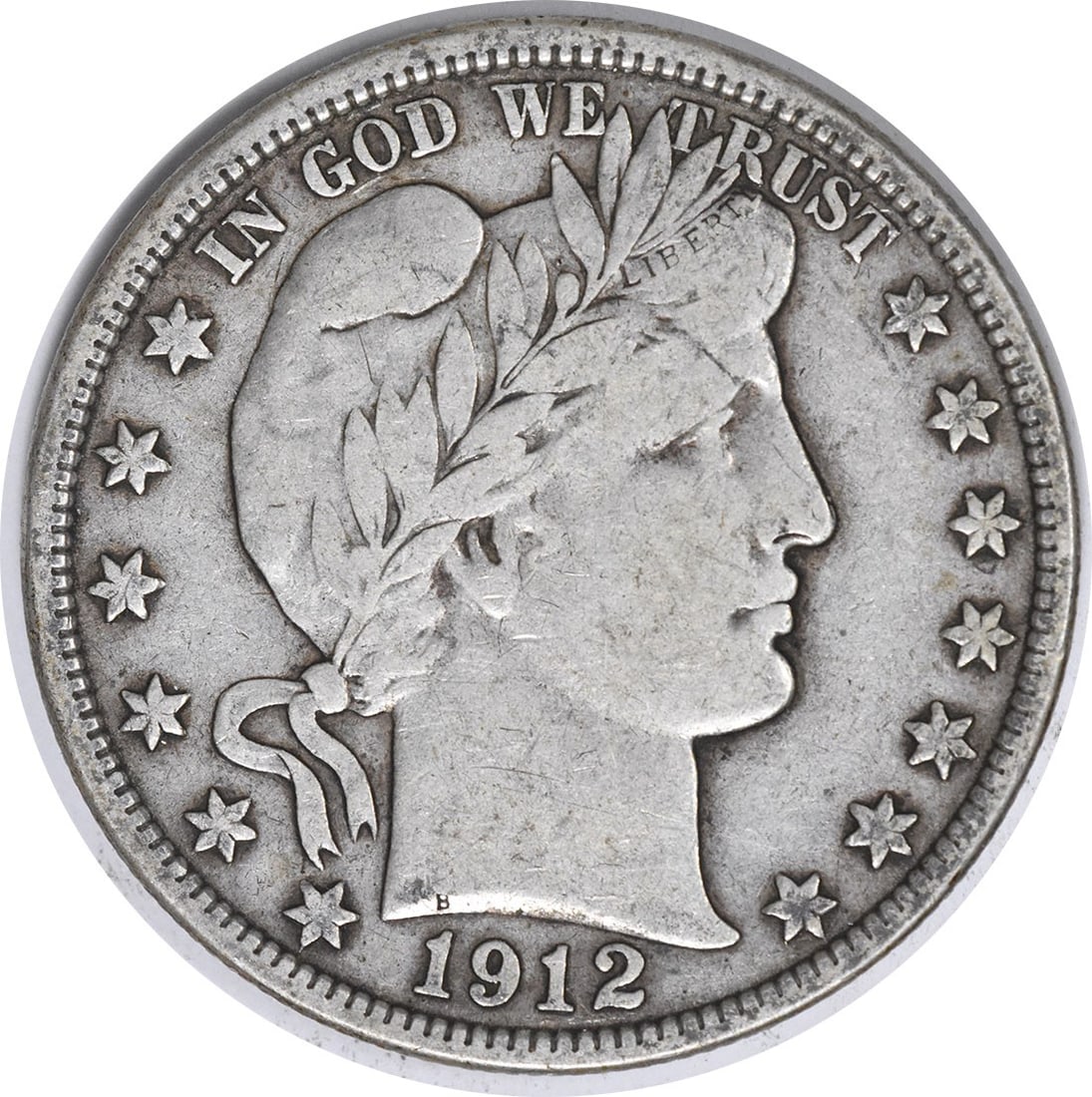 1912 United States Barber 50C Silver Half Dollar VF: 1912 United States Barber 50C Silver Half Dollar VF 1912 Barber Half Dollar in VF grade. This circulated, uncertified coin is composed of silver and is a pre-owned example of a United States 50C issue