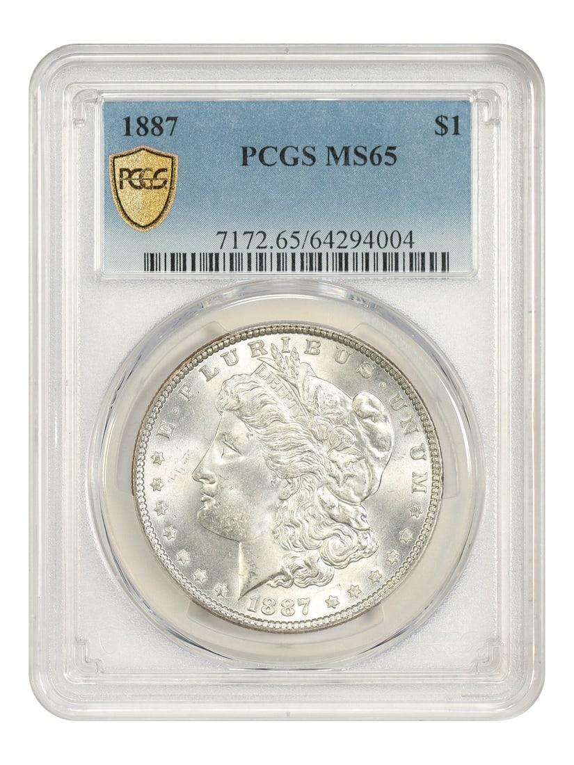 1887 Morgan Dollar $1 PCGS MS65 Philadelphia Mint Coin: 1887 Morgan Dollar $1 PCGS MS65 Philadelphia Mint Coin 1887 Morgan Dollar certified by PCGS in MS65 grade. This uncirculated Philadelphia issue is a popular collector date. It is considered a common d