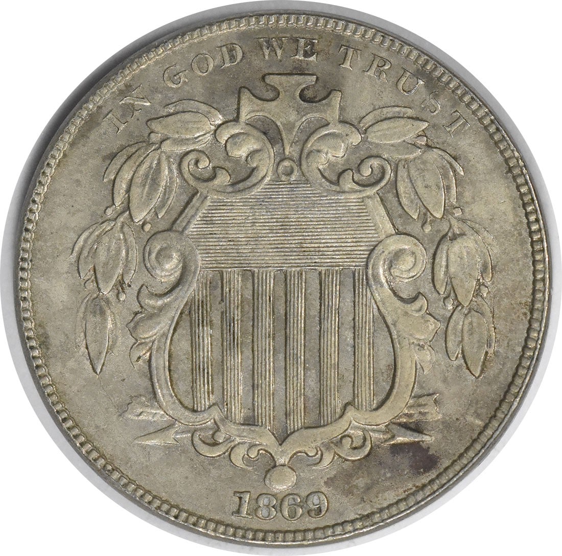 1869 Philadelphia Shield 5C Copper Nickel Coin AU Uncertified: 1869 Philadelphia Shield 5C Copper Nickel Coin AU Uncertified This 1869 Shield Nickel is a circulated coin from the United States, featuring the design by James Barton Longacre. Composed of 75% copper