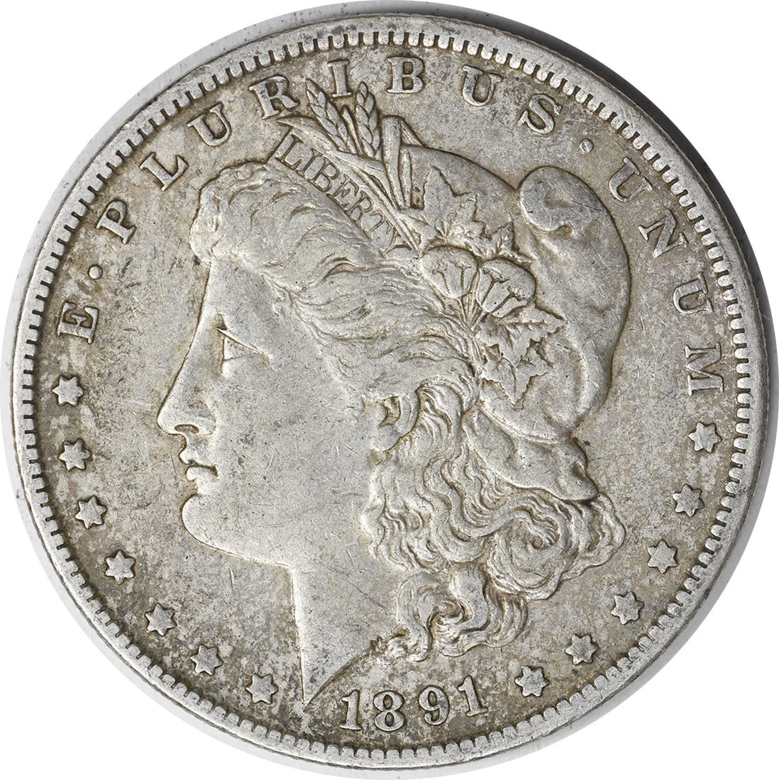1891 New Orleans Morgan Silver Dollar Extra Fine Uncertified Coin: 1891 New Orleans Morgan Silver Dollar Extra Fine Uncertified Coin This 1891-O Morgan Silver Dollar was minted in New Orleans and features a composition of 90% silver and 10% copper. Designed by George