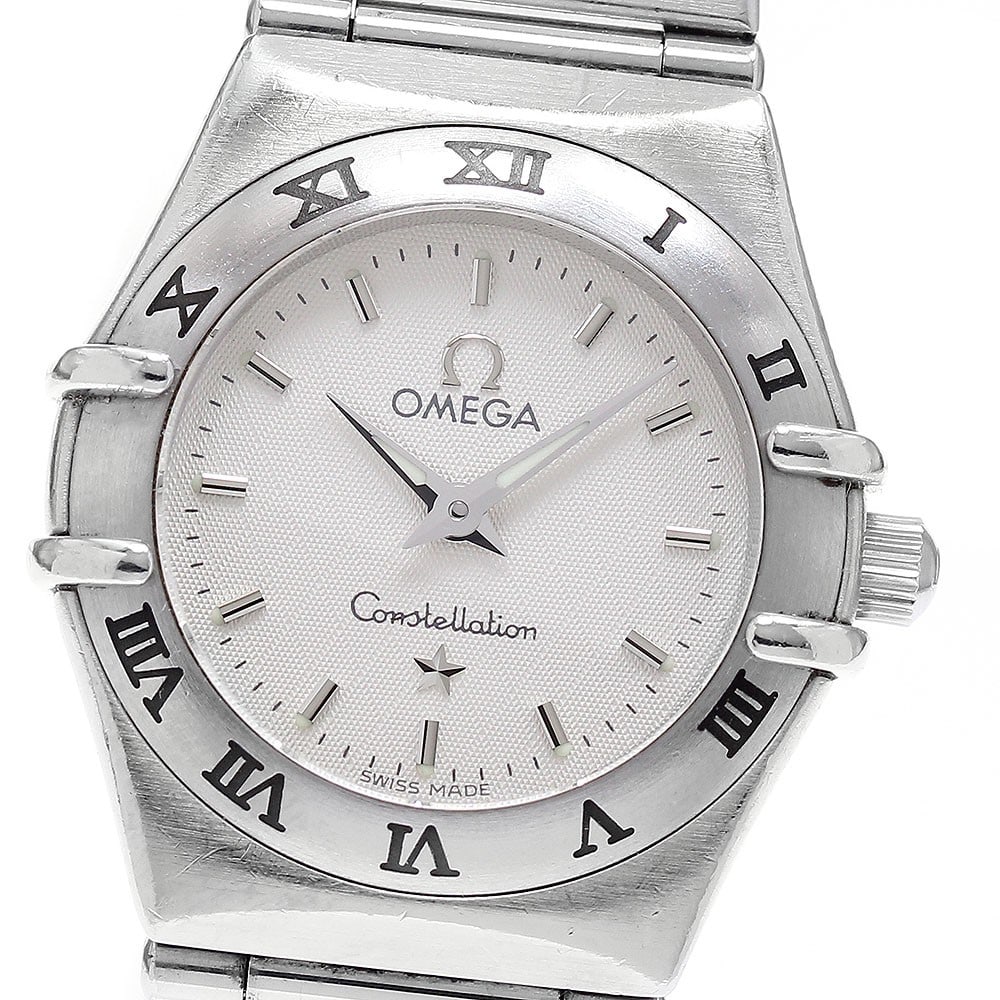 Omega Constellation Mini 1562.30 Ladies Quartz Steel Watch: Omega Constellation Mini 1562.30 Ladies Quartz Steel Watch This OMEGA Constellation Mini Quartz ladies wristwatch features a stainless steel case and band, complemented by a silver dial. The watch ope