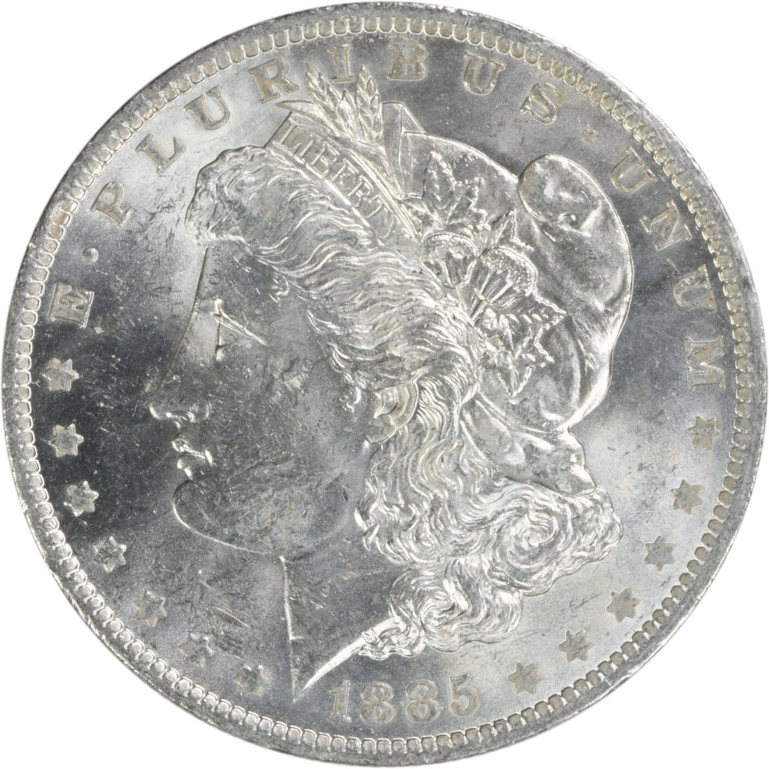 Uncirculated 1885 O Silver Dollar Morgan Type Brilliant Uncertified Example: Uncirculated 1885 O Silver Dollar Morgan Type Brilliant Uncertified Example This is an 1885-O Morgan Silver Dollar from the United States, featuring a Brilliant Uncirculated (BU) grade. The coin is co