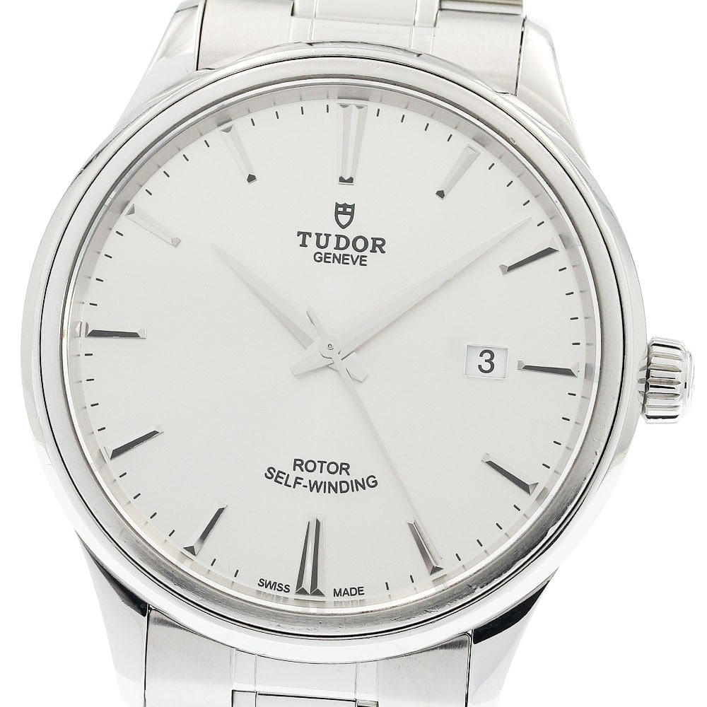 TUDOR Style 12700 Mens Automatic Date Wristwatch: TUDOR Style 12700 Mens Automatic Date Wristwatch TUDOR Style Date men's automatic wristwatch, reference 12700, made in Switzerland. It features a stainless steel case and bracelet, a silver dial, and 