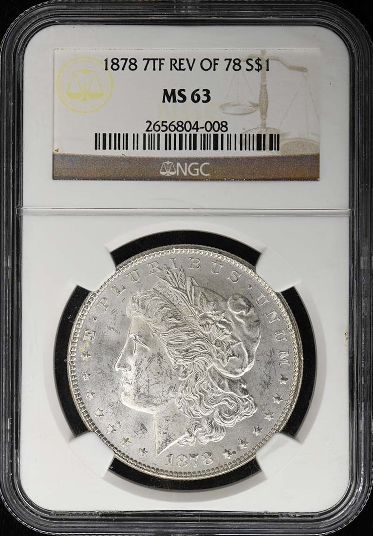 NGC MS63 1878 7TF Reverse of 78 Morgan Silver Dollar: NGC MS63 1878 7TF Reverse of 78 Morgan Silver Dollar 1878 Morgan Dollar certified by NGC and graded MS63. This uncirculated United States silver dollar is a pre-owned coin from the Philadelphia Mint. 