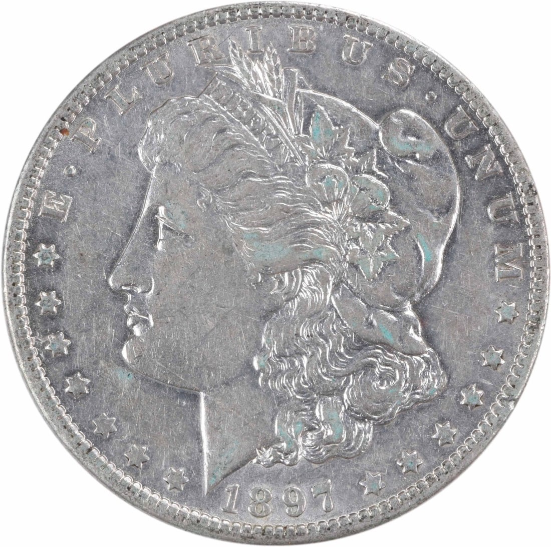 1897-O Morgan Dollar AU Grade Silver Coin New Orleans Mint Uncertified: 1897-O Morgan Dollar AU Grade Silver Coin New Orleans Mint Uncertified This is an 1897-O Morgan Silver Dollar, struck at the New Orleans Mint. The coin is composed of 90% silver and 10% copper, with a