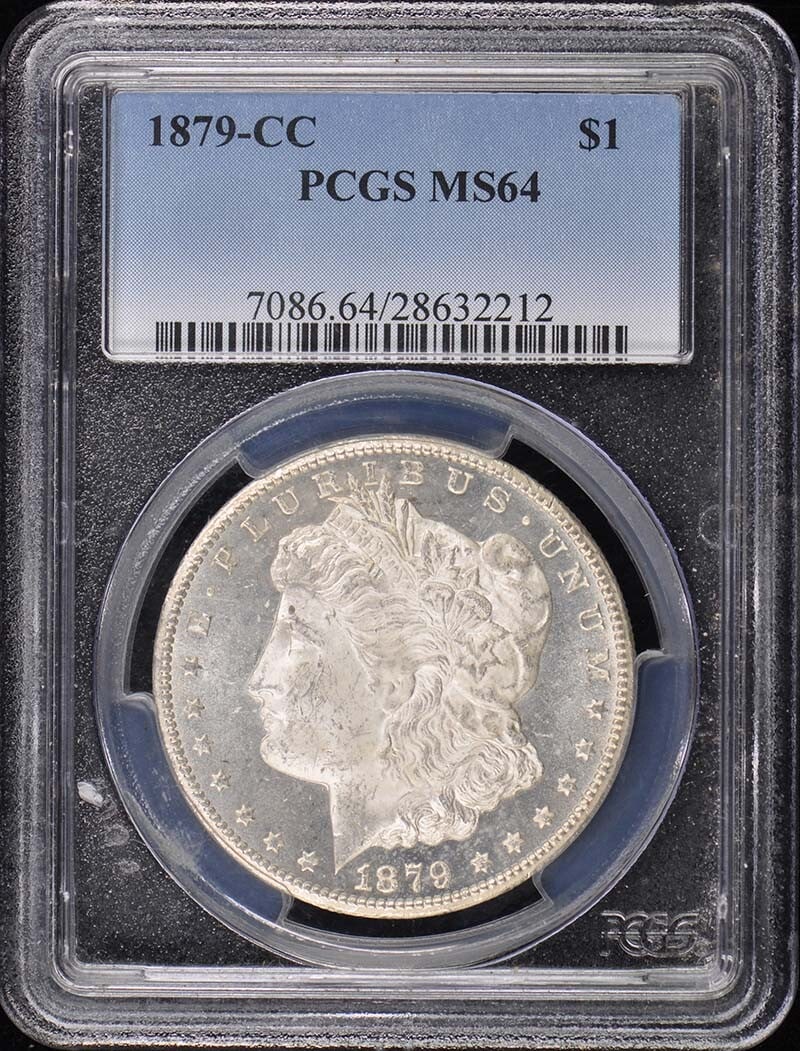 1879-CC Morgan Dollar PCGS MS64 Uncirculated Coin: 1879-CC Morgan Dollar PCGS MS64 Uncirculated Coin This 1879-CC Morgan Dollar is certified by PCGS with a grade of MS64, reflecting its exceptional uncirculated condition. Minted in Carson City, this s