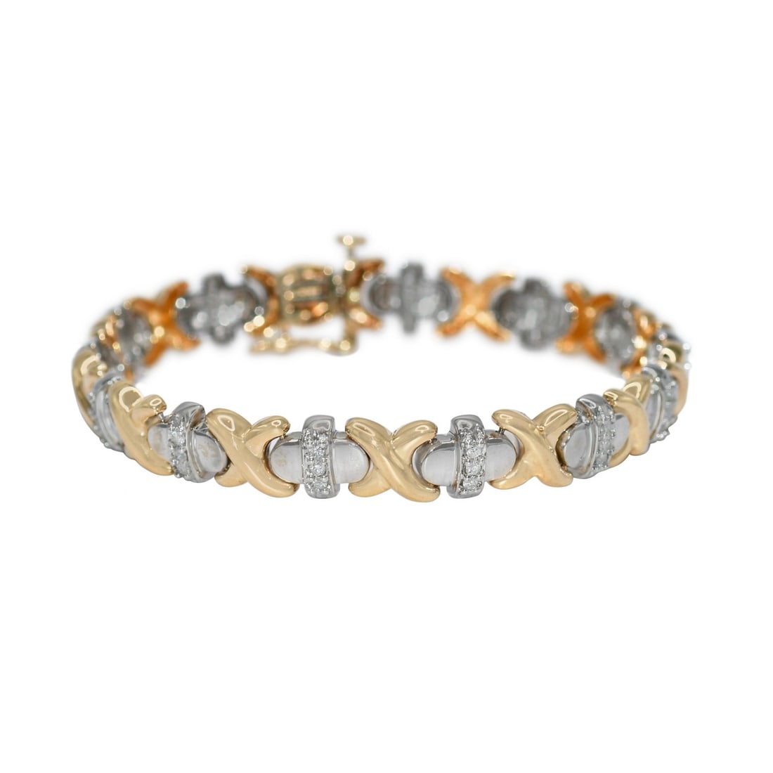 Diamond Bracelet in 10K Yellow and White Gold 18.4g 1.00tdw: Diamond Bracelet in 10K Yellow and White Gold 18.4g 1.00tdw Pre-owned multi-tone gold bracelet set with natural round brilliant diamonds. This ladies bracelet features a buckle closure and is