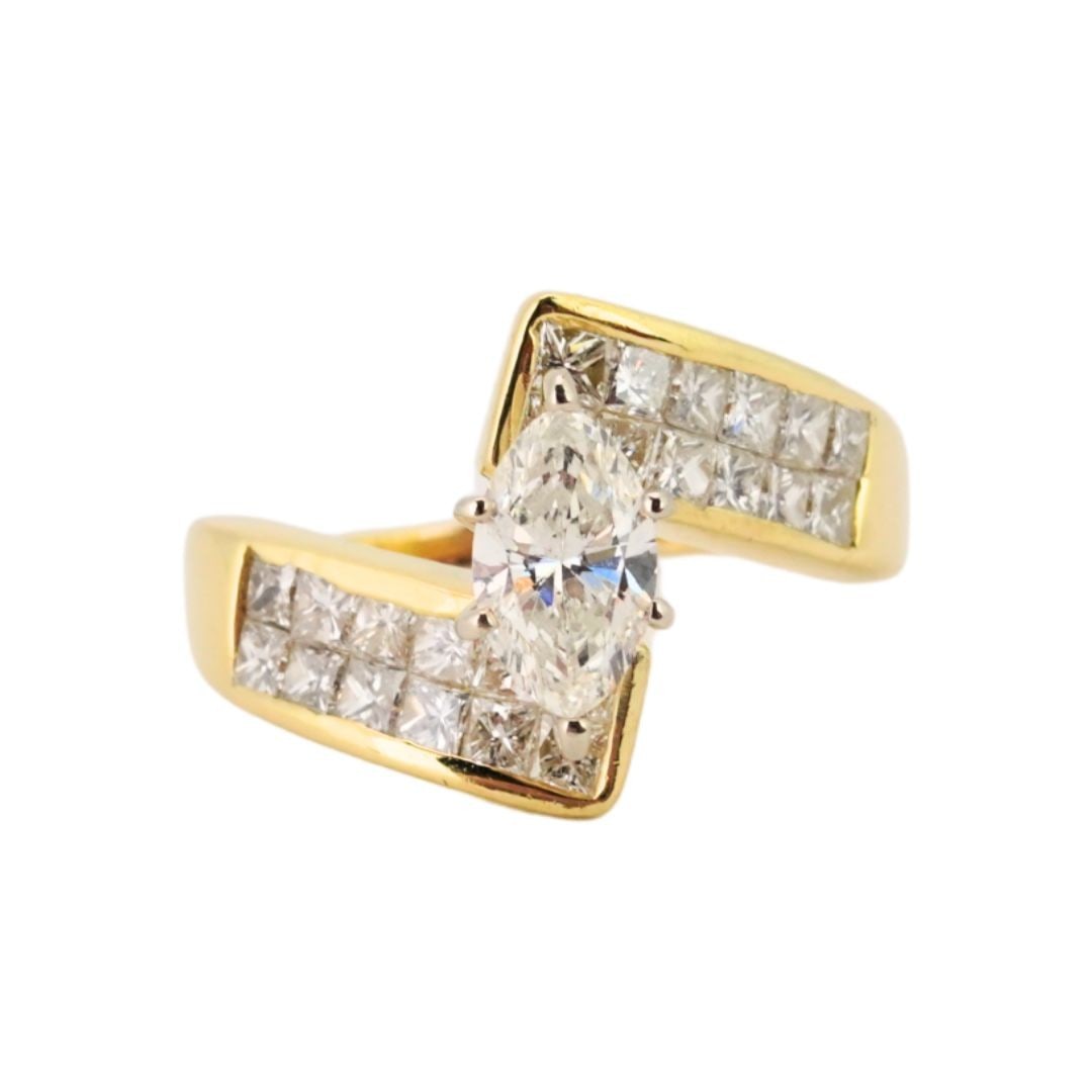 Vintage 18k Yellow Gold Diamond Ring Marquise Center 1.85 TDW Size 7.25: Vintage 18k Yellow Gold Diamond Ring Marquise Center 1.85 TDW Size 7.25 Vintage ladies' 18k yellow gold ring featuring a natural marquise-cut diamond center accented by side diamonds. The center