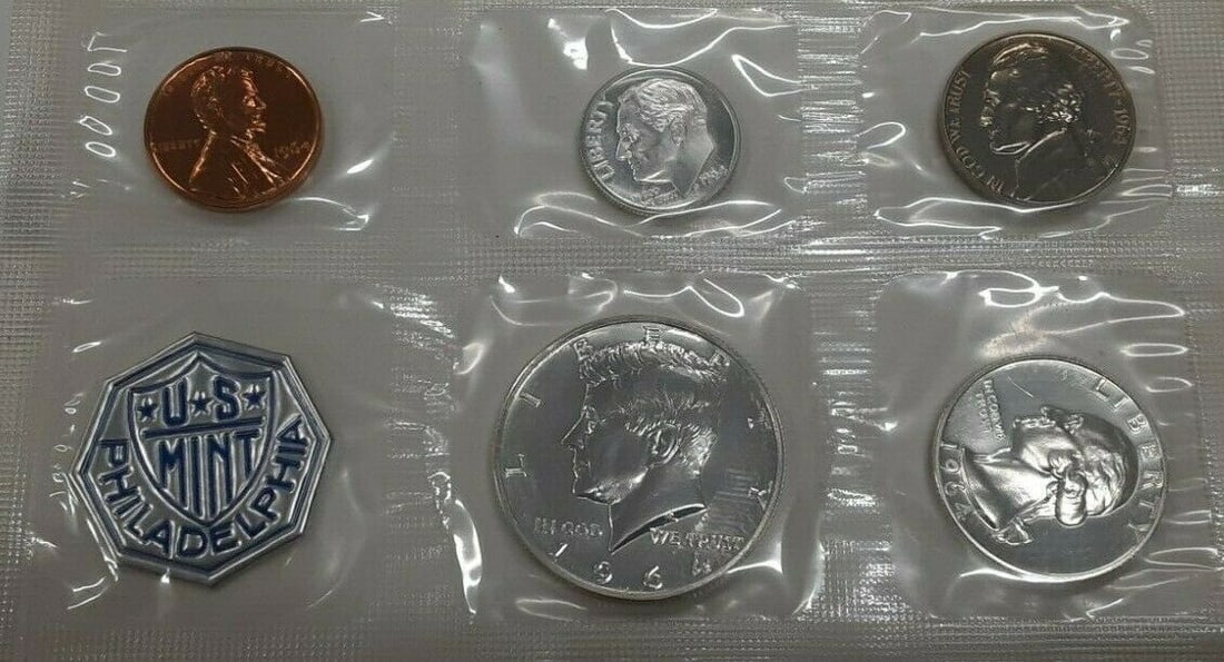 1964 Silver Proof Coin Set With Accented Hair Kennedy Half Original Packaging: 1964 Silver Proof Coin Set With Accented Hair Kennedy Half Original Packaging This 1964 US Mint Proof Set features silver half dollar, quarter, and dime coins, all presented in their original cellopha