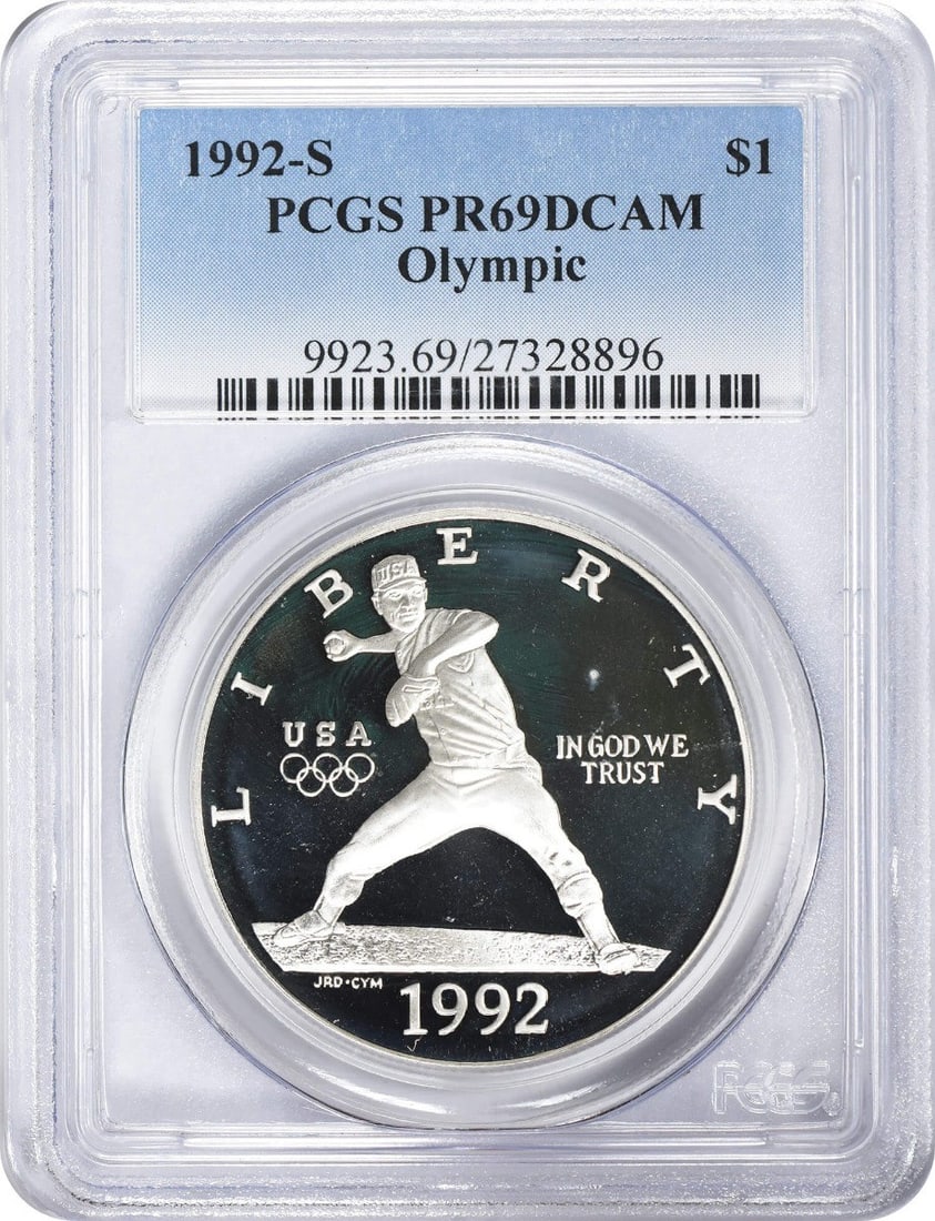 PCGS PR69DCAM 1992 S Olympic Silver Dollar Commemorative: PCGS PR69DCAM 1992 S Olympic Silver Dollar Commemorative This 1992-S Olympic Commemorative Silver Dollar is a proof coin graded PR69DCAM by PCGS. Struck in silver, this uncirculated coin was issued by