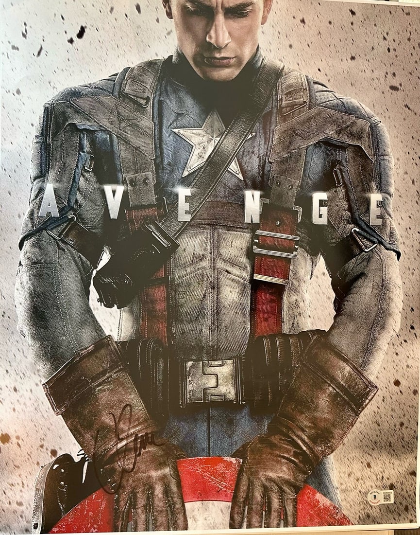 Chris Evans Signed 16x20 Captain America Photo Beckett Certified: Chris Evans Signed 16x20 Captain America Photo Beckett Certified This striking 16x20 photograph features the iconic Chris Evans as Captain America, meticulously signed in black permanent marker. The a